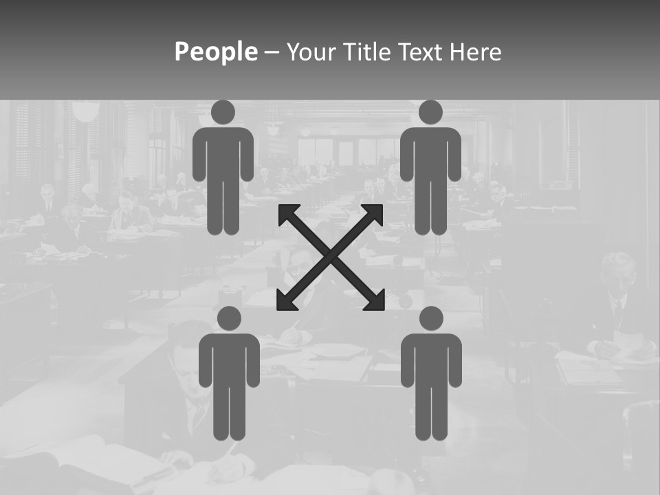 A Group Of People Sitting At Desks In A Room PowerPoint Template