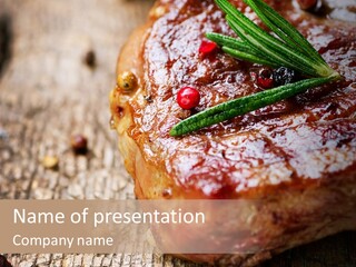 A Piece Of Meat With A Sprig Of Rosemary On Top Of It PowerPoint Template