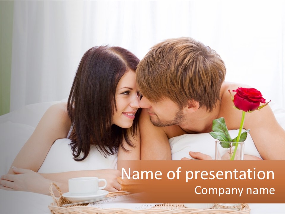 A Man And Woman Laying In Bed With A Rose PowerPoint Template