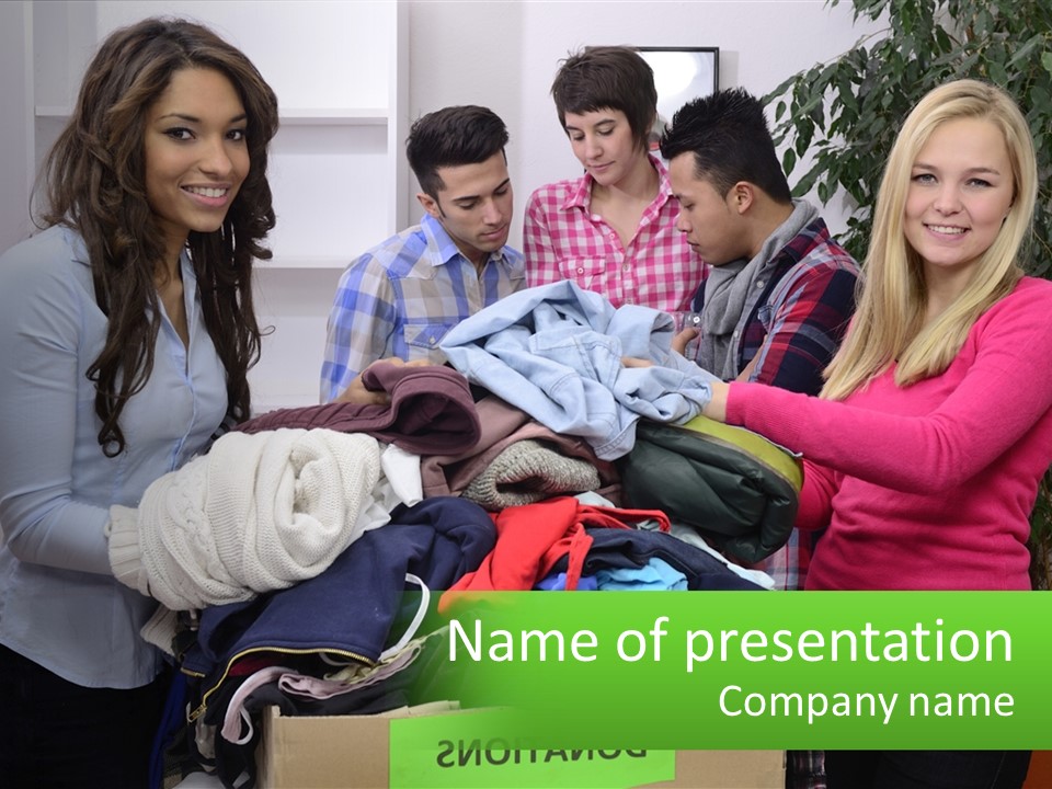 A Group Of People Standing Around A Pile Of Clothes PowerPoint Template