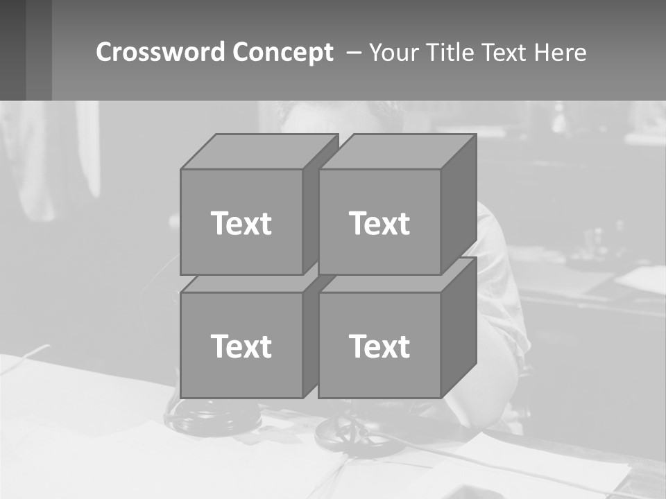A Man Sitting At A Desk Talking On A Phone PowerPoint Template