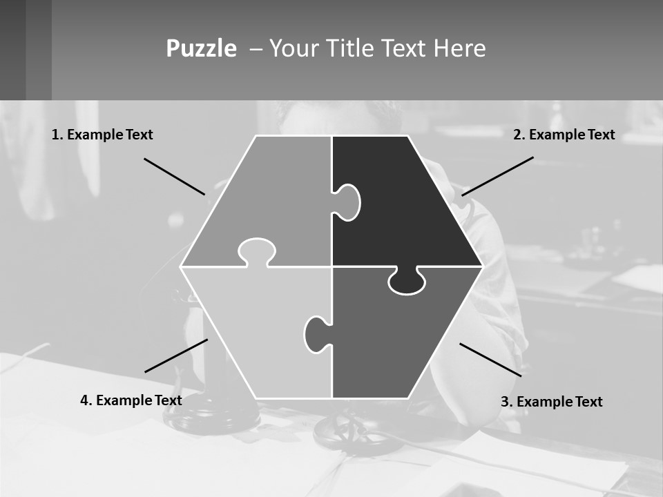 A Man Sitting At A Desk Talking On A Phone PowerPoint Template