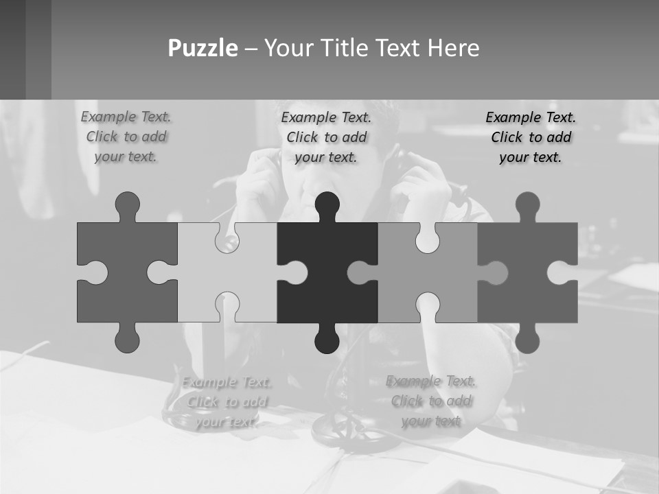 A Man Sitting At A Desk Talking On A Phone PowerPoint Template