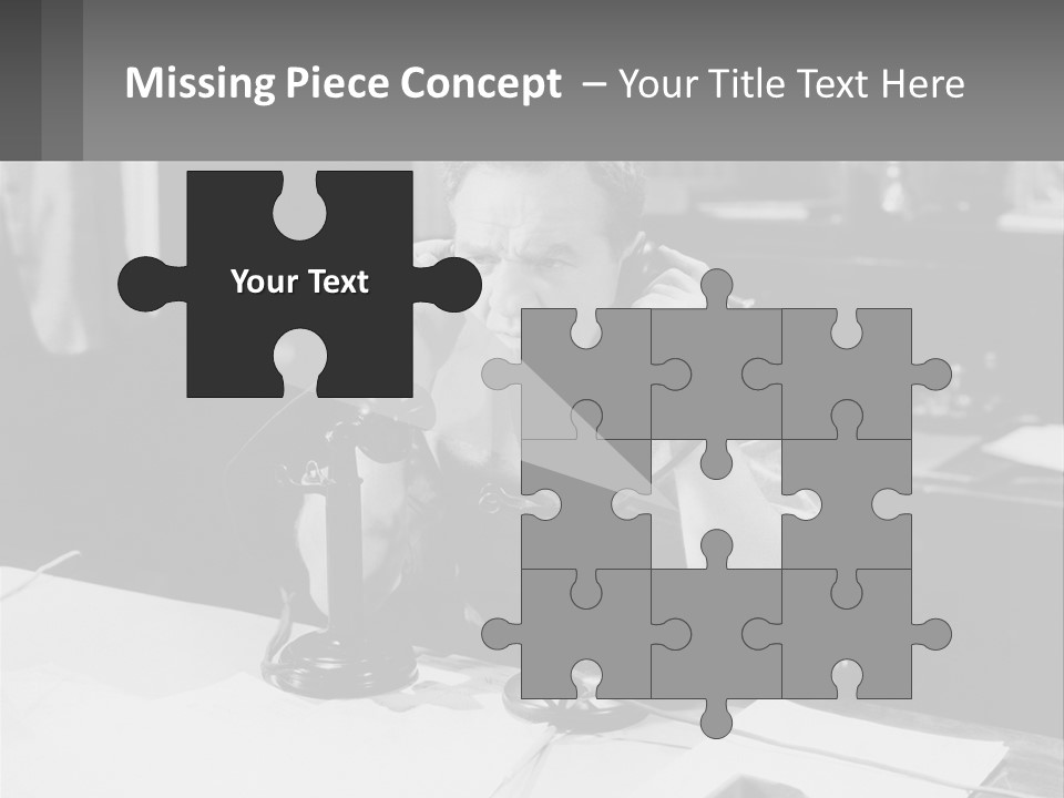 A Man Sitting At A Desk Talking On A Phone PowerPoint Template