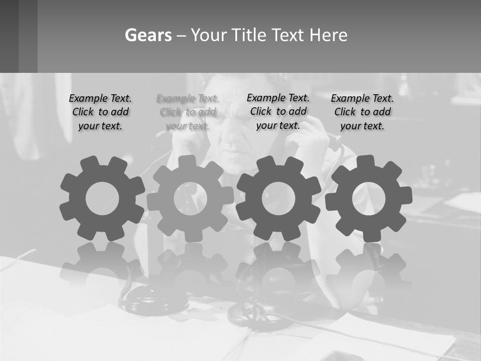 A Man Sitting At A Desk Talking On A Phone PowerPoint Template