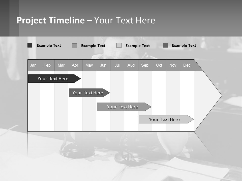 A Man Sitting At A Desk Talking On A Phone PowerPoint Template