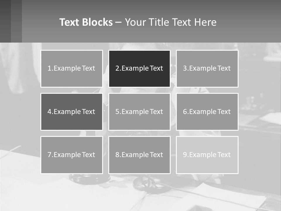 A Man Sitting At A Desk Talking On A Phone PowerPoint Template