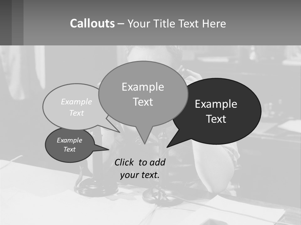 A Man Sitting At A Desk Talking On A Phone PowerPoint Template