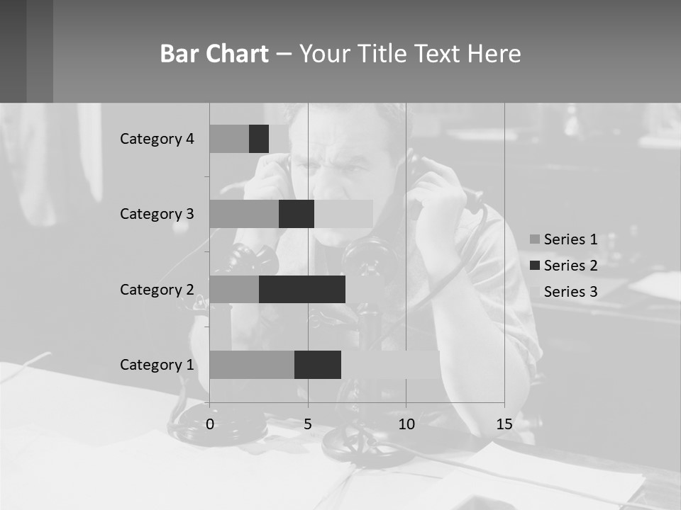 A Man Sitting At A Desk Talking On A Phone PowerPoint Template
