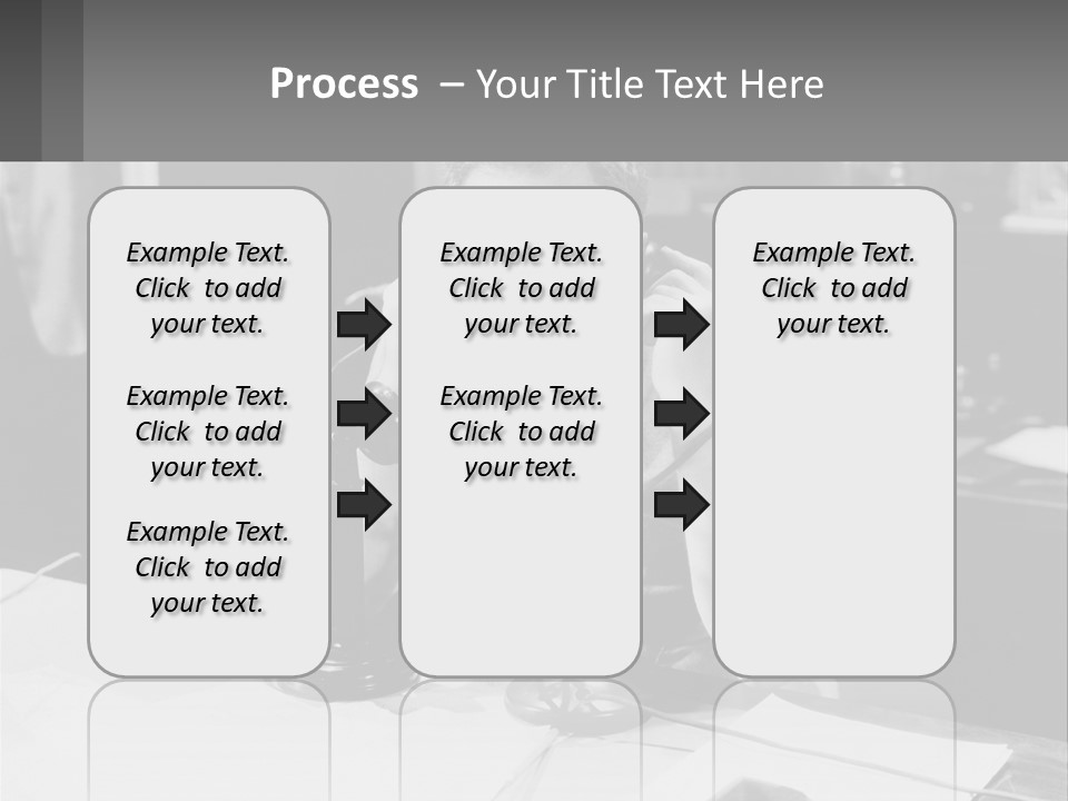 A Man Sitting At A Desk Talking On A Phone PowerPoint Template
