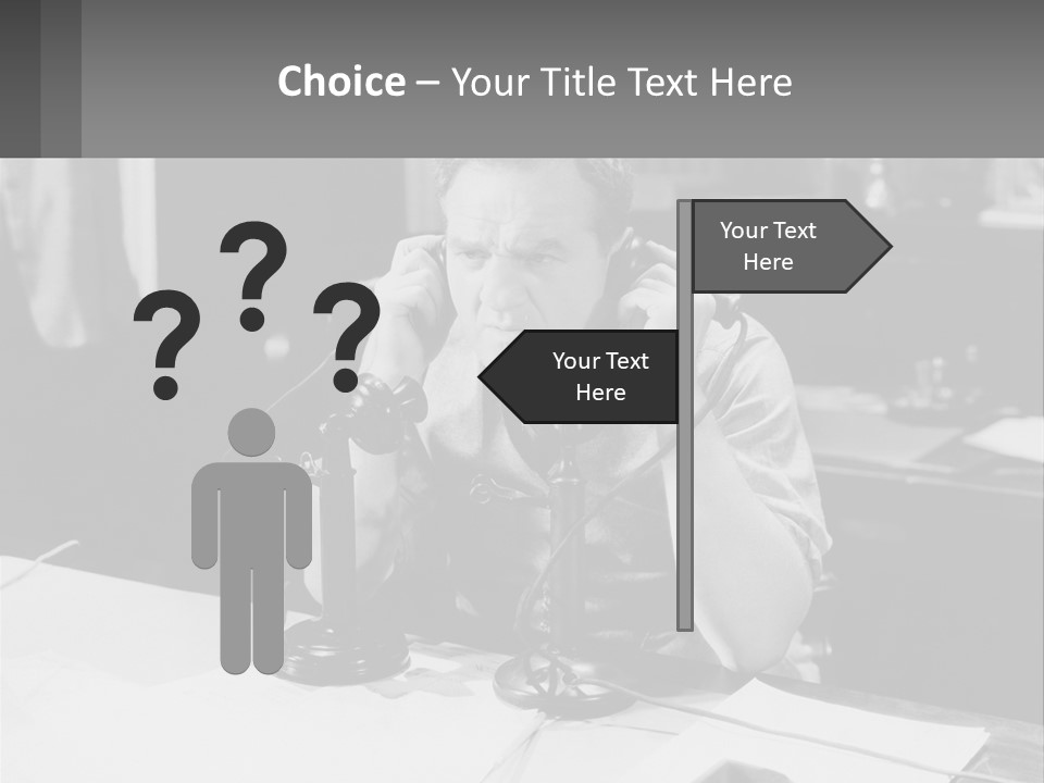 A Man Sitting At A Desk Talking On A Phone PowerPoint Template