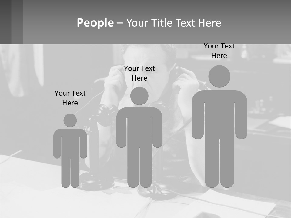 A Man Sitting At A Desk Talking On A Phone PowerPoint Template