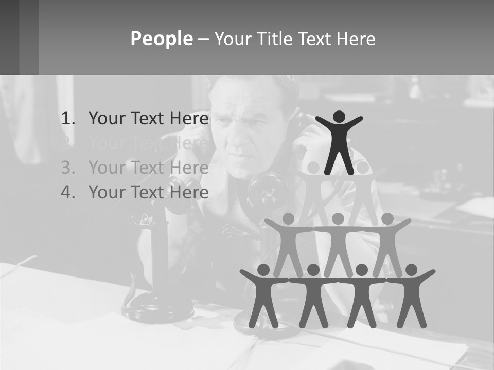 A Man Sitting At A Desk Talking On A Phone PowerPoint Template