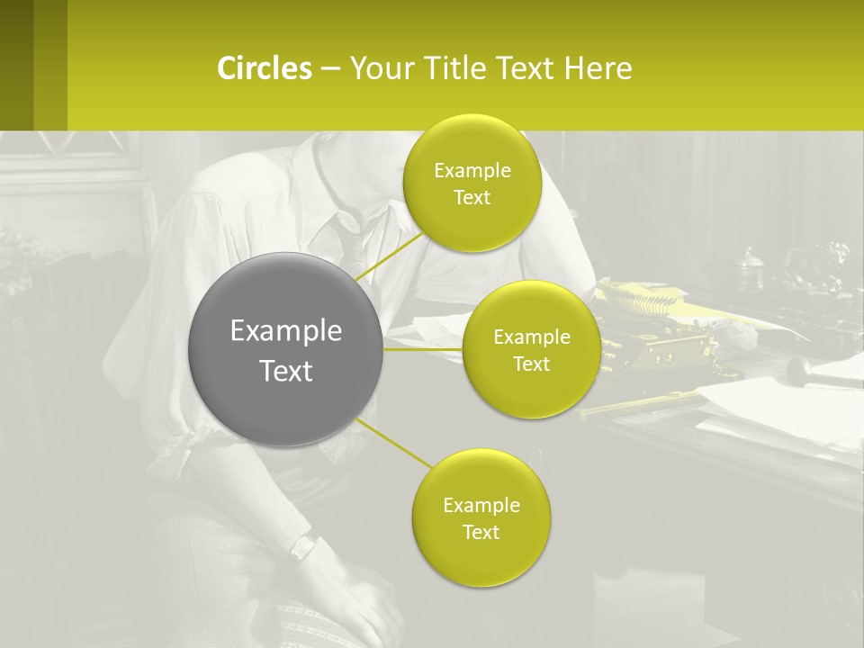 A Man Sitting At A Desk With A Typewriter PowerPoint Template