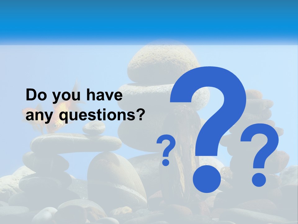 A Group Of Rocks Stacked On Top Of Each Other With A Goldfish In The PowerPoint Template