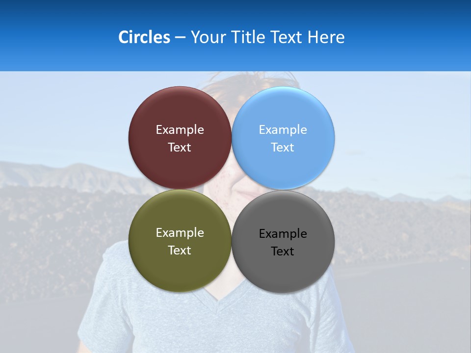 A Young Boy Standing In Front Of A Mountain PowerPoint Template