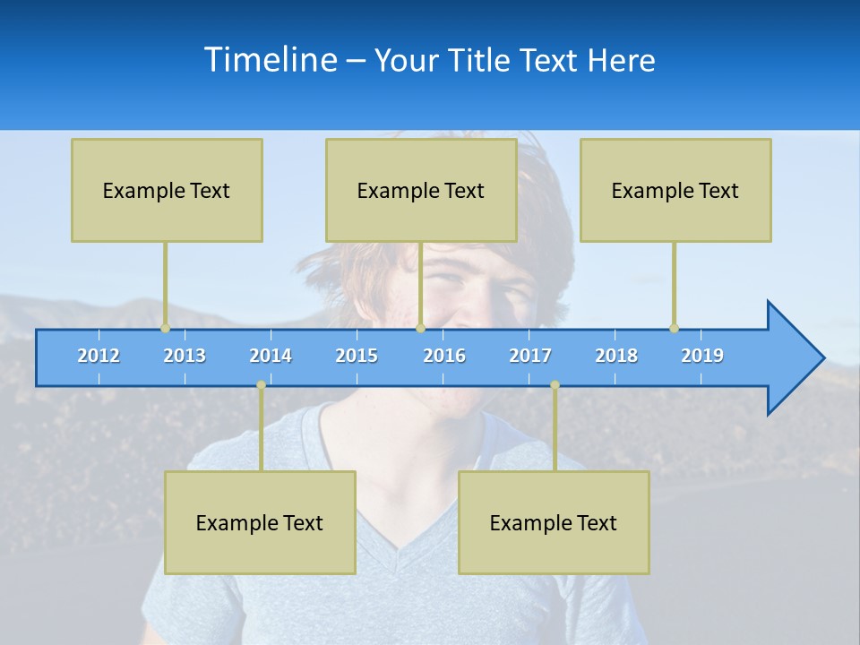 A Young Boy Standing In Front Of A Mountain PowerPoint Template