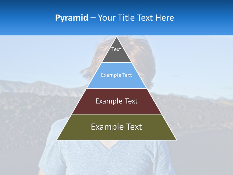 A Young Boy Standing In Front Of A Mountain PowerPoint Template