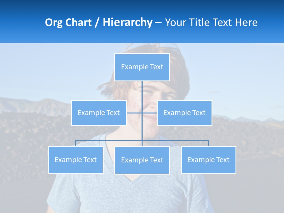 A Young Boy Standing In Front Of A Mountain PowerPoint Template