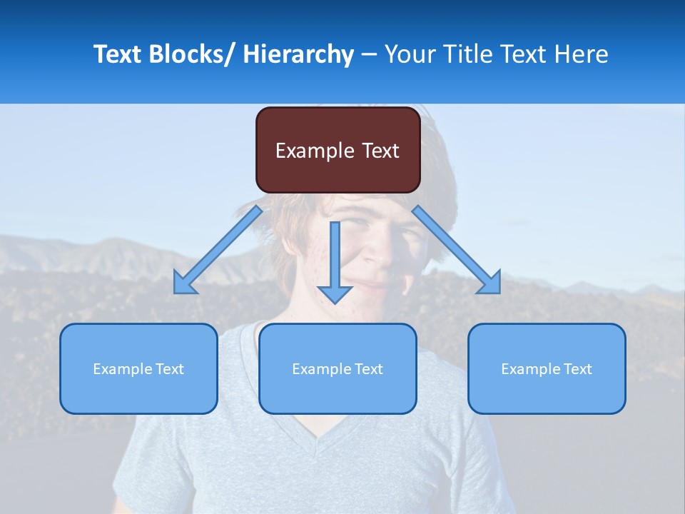 A Young Boy Standing In Front Of A Mountain PowerPoint Template