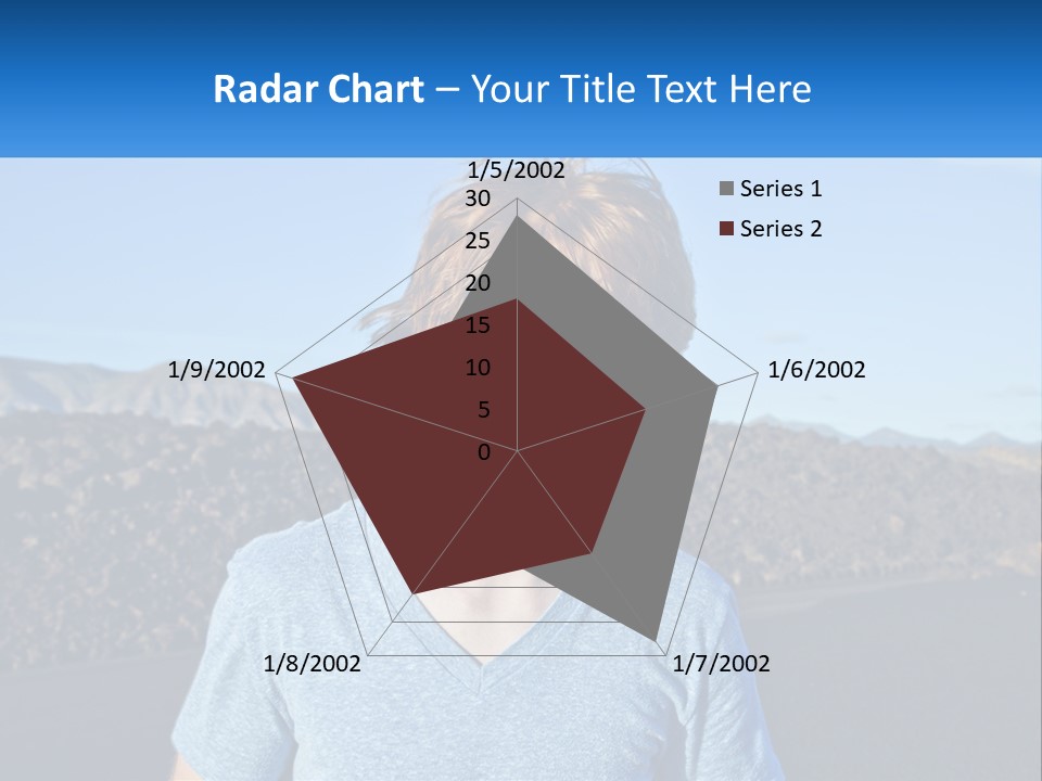 A Young Boy Standing In Front Of A Mountain PowerPoint Template