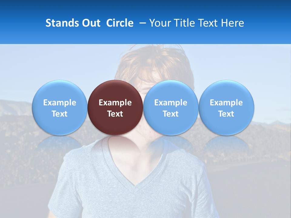 A Young Boy Standing In Front Of A Mountain PowerPoint Template