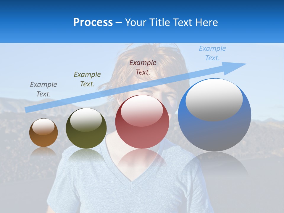 A Young Boy Standing In Front Of A Mountain PowerPoint Template