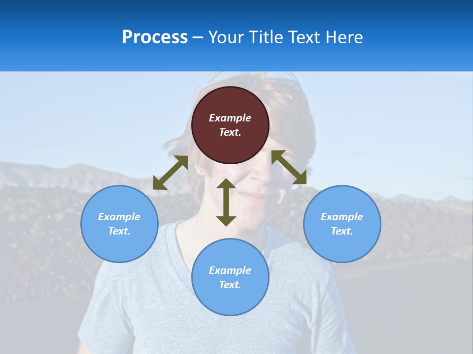 A Young Boy Standing In Front Of A Mountain PowerPoint Template