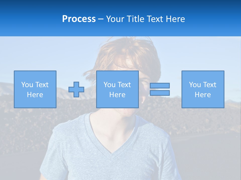 A Young Boy Standing In Front Of A Mountain PowerPoint Template