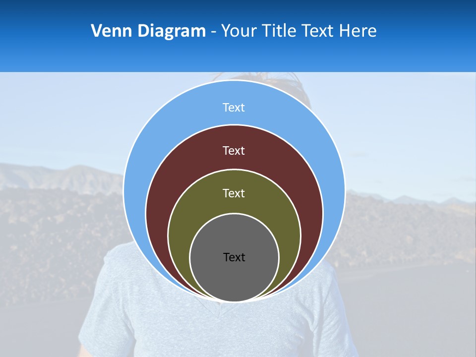 A Young Boy Standing In Front Of A Mountain PowerPoint Template