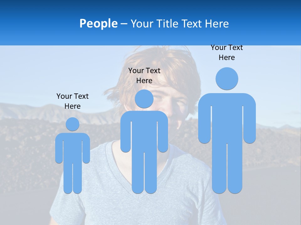 A Young Boy Standing In Front Of A Mountain PowerPoint Template