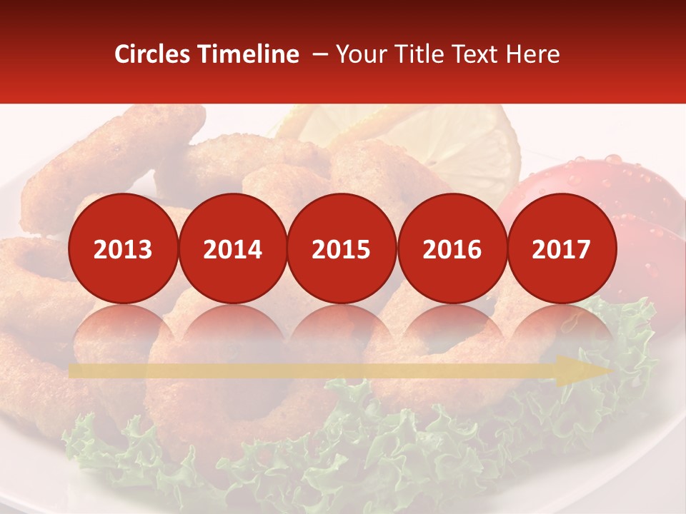 A Plate Of Onion Rings With Lettuce And Tomatoes PowerPoint Template