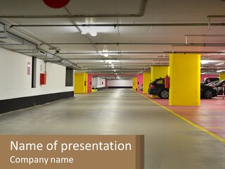 An Empty Parking Garage With Cars Parked In It PowerPoint Template