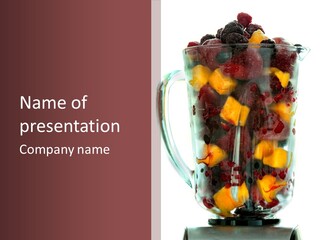 A Blender Filled With Fruit On Top Of A Table PowerPoint Template