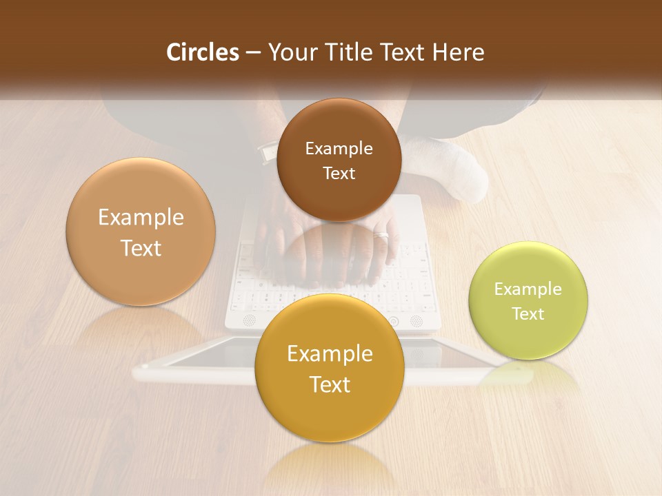 A Person Sitting On The Floor Using A Laptop PowerPoint Template