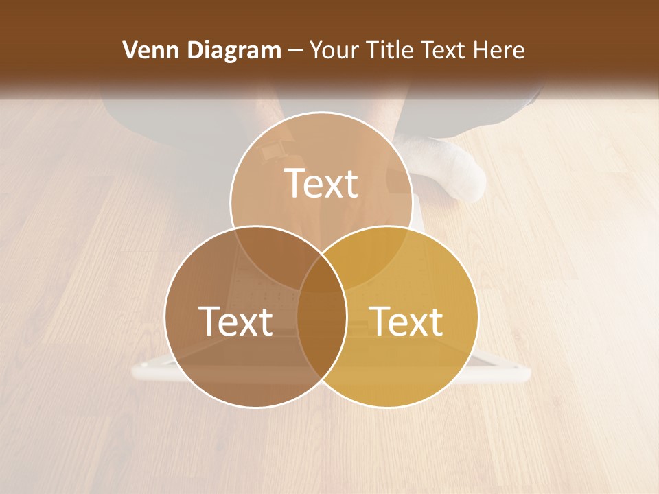 A Person Sitting On The Floor Using A Laptop PowerPoint Template