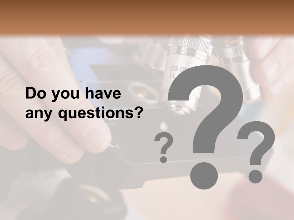 A Person Using A Microscope To Examine Something PowerPoint Template