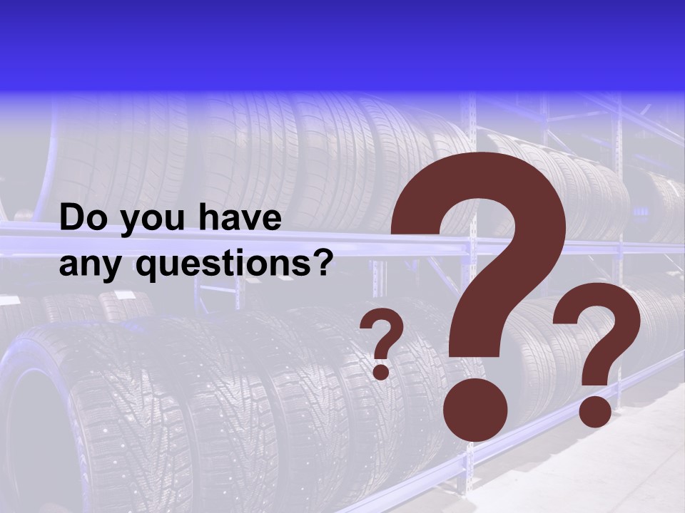 A Bunch Of Tires That Are On A Rack PowerPoint Template