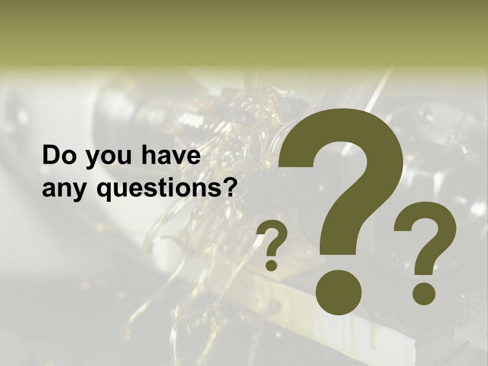 A Machine That Is Pouring Oil On A Piece Of Machinery PowerPoint Template