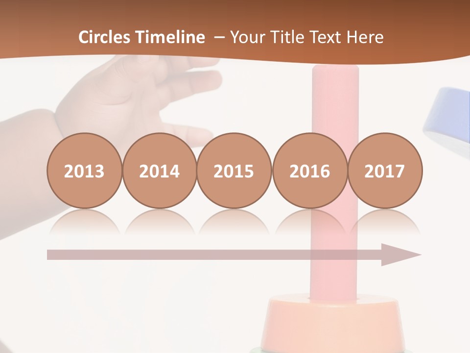 A Baby Is Playing With A Toy In The Middle Of A Presentation PowerPoint Template