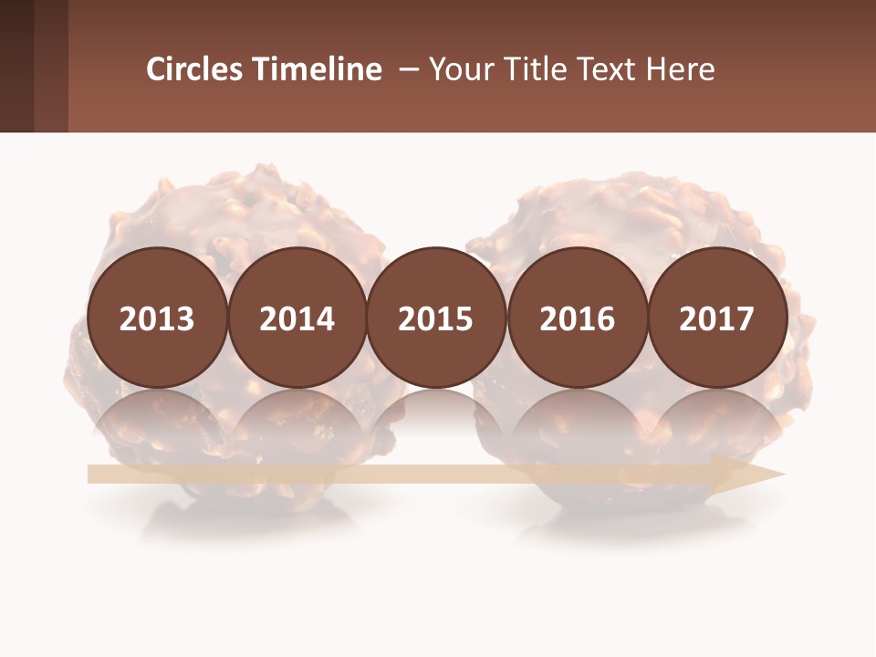 Two Chocolate Balls With Nuts On Top Of Them PowerPoint Template
