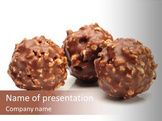 Three Chocolate Balls With Nuts On A White Background PowerPoint Template