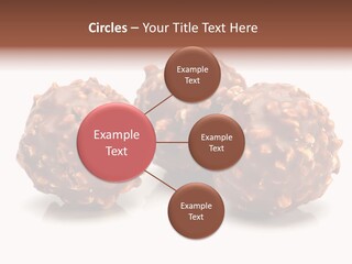 Three Chocolate Balls With Nuts On A White Background PowerPoint Template