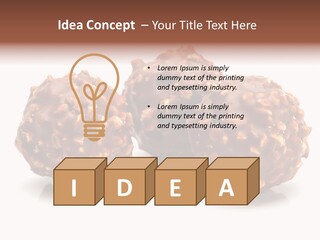 Three Chocolate Balls With Nuts On A White Background PowerPoint Template