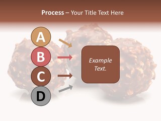 Three Chocolate Balls With Nuts On A White Background PowerPoint Template
