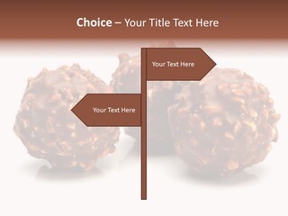 Three Chocolate Balls With Nuts On A White Background PowerPoint Template
