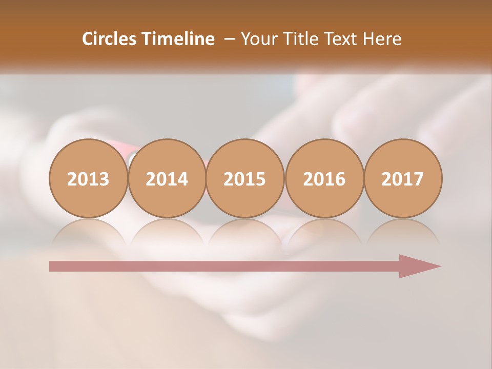 A Person Holding A Cell Phone In Their Hands PowerPoint Template