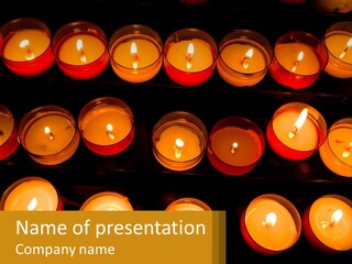 Many Lit Candles Are Arranged In A Row PowerPoint Template