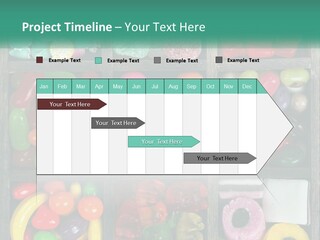 A Wooden Box Filled With Lots Of Candy PowerPoint Template