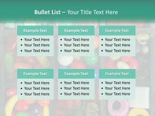 A Wooden Box Filled With Lots Of Candy PowerPoint Template